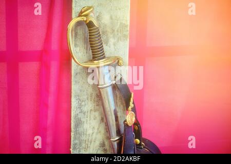 An ancient saber of the Russian-French war of the 19th century. Vintage weapons of the period of battles of the Russian and French armies. Stock Photo