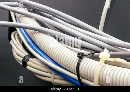 Bundle of electrical wires and network cables, close-up Stock Photo
