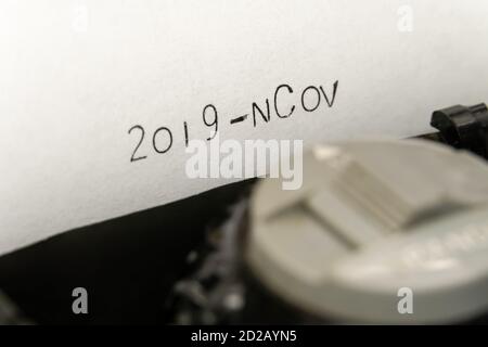 Close up printed text 2019 - nCov on an old typewriter Stock Photo
