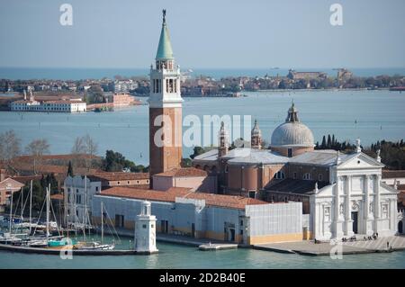 Venice, San Marco from la Giudecca Island, traditional Venetian offshore boat, sunny day Stock Photo
