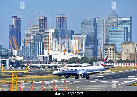 British Airways plane turning at London City Airport runway for taking off for business travel from Canary Wharf East London Docklands England UK