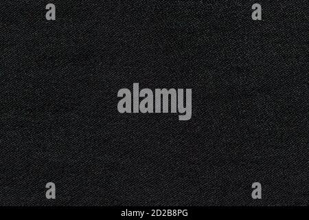 Abstract black synthetic fabric texture and background. Detail of canvas textile material. Stock Photo