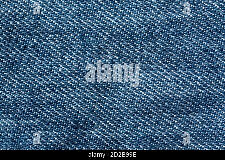 Abstract blue jeans fabric texture and background. Detail of jean textile material. Stock Photo