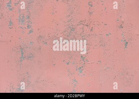 Texture, background of a light red concrete wall with grey patches Stock Photo