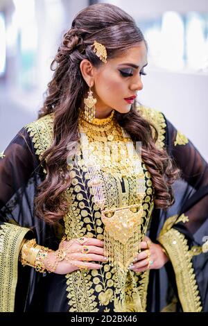 Arab Female in traditional dress with traditional jewelry Stock Photo