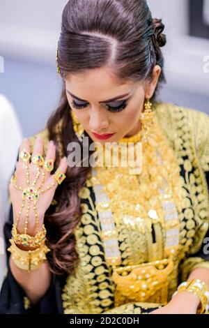 Arab Female in traditional dress with traditional jewelry Stock Photo