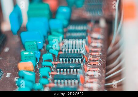 Vintage electronic circuit boards with radio parts and chips, close-up, macro photo Stock Photo