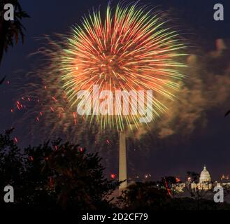 Fireworks on the Mall in Washington DC showing the US Capitol and the Washingon Monument Stock Photo