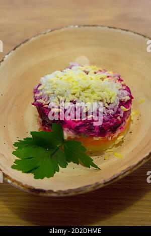Russian beetroot salad with herring Stock Photo - Alamy