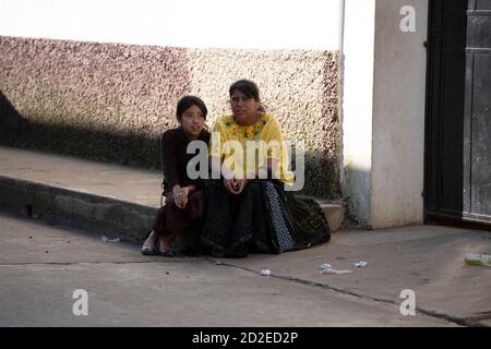 An indigenous Poqomchi Maya woman with her daughter in San Cristobal Verapaz, Guatemala. Stock Photo