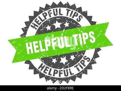 helpful tips stamp. round grunge sign with ribbon Stock Vector