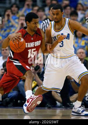 UCLA Bruin's Josh Shipp (R) guards Stanford Cardinal's Lawrence Hill during the Pac-10 Men's Basketball Tournament final in Los Angeles, California March 15, 2008. REUTERS/Mike Blake (UNITED STATES)