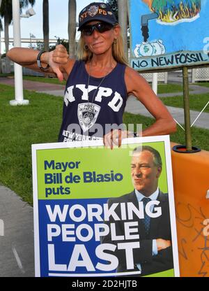 MIAMI, FLORIDA - JUNE 26: Protests outside prior to the first 2020 Democratic presidential debate including New York police officers that are protesting New York Mayor Bill de Blasio. A field of 20 Democratic presidential candidates was split into two groups of 10 for the first debate of the 2020 election, taking place over two nights at Knight Concert Hall of the Adrienne Arsht Center for the Performing Arts of Miami-Dade County on June 26, 2019 in Miami, Florida  People:  Atmosphere Credit: Hoo-me / MediaPunch Stock Photo