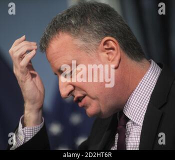 NEW YORK, NY - MARCH 18: New York City Mayor Bill de Blasio signed five pieces of legislation into law – Intro 600-A, 611-A, and 619-A, in relation to increased transparency of Veterans’ services and increasing the size of the Veterans’ Advisory Board; Intro 74-A, in relation to creating a formal process to streamline the removal of downed trees; and Intro 423-A, in relation to several reports from Small Businesses Services and Mayor’s Office of Contract Services relating to the development of worker cooperative businesses on March 18, 2015 in New York City People:  New York City Mayor Bill de Stock Photo