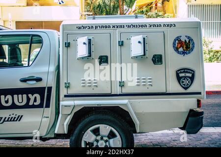Closeup of an official police car patrolling the streets of the city center of the metropolitan area Stock Photo