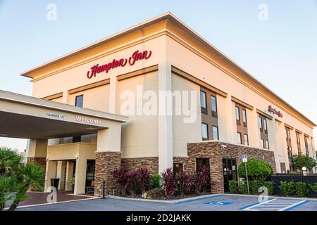 Spring Hill Florida,Hampton Inn,hotel hotels lodging inn motel motels,building exterior,front entrance,porte-cochere,covered driveway,visitors travel Stock Photo