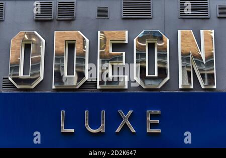 London, UK. 06th Oct, 2020. A sign on the Odeon Luxe in London's Haymarket.The Odeon cinema chain is cutting the opening hours of some of its cinemas in the UK and Ireland to weekends only because of delays to new film releases. The chain, which operates 120 theatres, said it will affect a quarter of its cinemas, which will now open between Friday and Sunday only. Credit: SOPA Images Limited/Alamy Live News Stock Photo