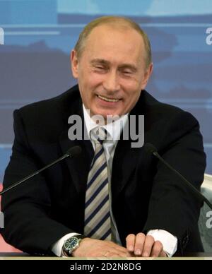 Russian President Vladimir Putin Smiles As He Arrives In Stock Photo 