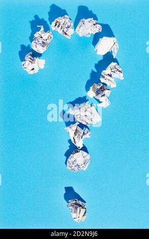 Question mark on blue background Stock Photo
