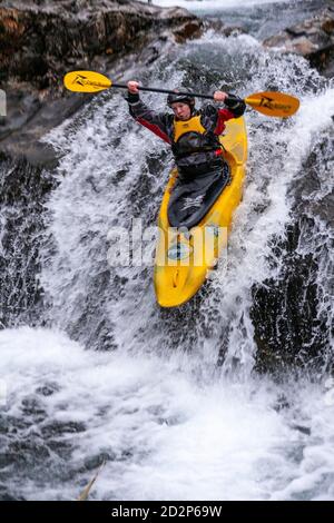 Canoeist in White Water, Snowdonia, North Wales Stock Photo