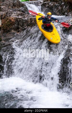 Canoeist in White Water, Snowdonia, North Wales Stock Photo