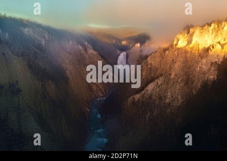 Sunrise at the Lower Falls of the Yellowstone River and Grand Canyon, Yellowstone National Park, Wyoming, USA Stock Photo