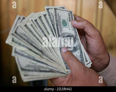 A Currency Dealer Counts Pakistani Rupees At His Roadside Shop In Karachi October 23 2008 Pakistan Has Not Formally Asked For A Facility From The International Monetary Fund Imf The Prime Minister S A Currency Dealer Counts Pakistani Rupees At His Roadside Shop In Karachi October 23 2008 Pakistan Has Not Formally Asked For A Facility From The International Monetary Fund Imf The Prime Minister S