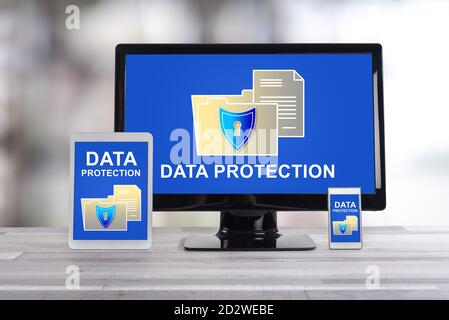 Data protection concept shown on different information technology devices Stock Photo
