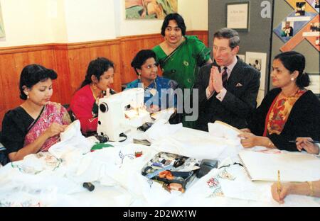 The Prince of Wales chats with a group of Asian women during his visit to the Bromley-by-Bow Centre, which provides a church, creche, meeting place, cafe and arts centre for local people, today (Wednesday). See PA Story ROYAL Charles. Photo by TIMES. Stock Photo