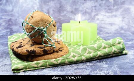Chocolate-chip cookies tied with thread Stock Photo - Alamy