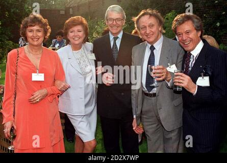 Prime Minister John Major with showbiz personalities at a Downing Street party hosted by him today (Monday). From left: Anna Jones, Blind Date presenter Cilla Black, John Major, comedian Ken Dodd and dancer Lionel Blair. Photo by Michael Stephens/PA Stock Photo