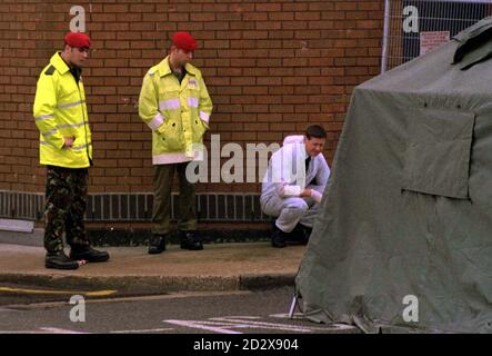 Police Examine The Scene Where Two Women Were Killed And Seven Ot Hers ...