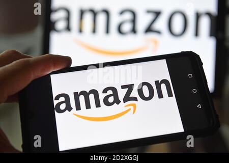 Amazon logos displayed on screens in London, UK. Stock Photo