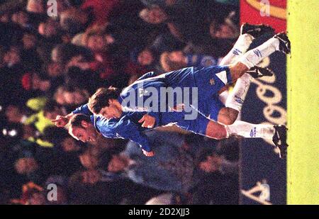 Chelsea's Frank LeBoeuf celebrates with teammate Gianfranco Zola after scoring from a penalty to win tonight's (Wed) FA Cup 5th round replay against Leicester, at Stamford Bridge. Photo by Adam Butler/PA Stock Photo