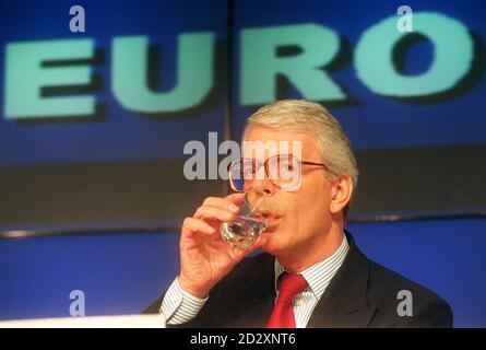 Prime Minister John Major takes a drink during this morning's (Thursday) election campaign news conference at  Tory party headquarters, in London. Photo by Adam Butler/PA Stock Photo