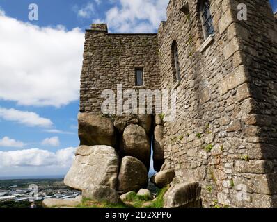 Carn Brea Castle overlooks Redruth from the top of Carn Brea, Cornwall. Stock Photo