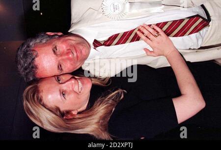 Triumphant anti-sleaze candidate Martin Bell, congratulated by his daughter Mellisa,  at last night's party in  Knutsford, Cheshire. The former BBC war reporter, standing on an independent anti-corruption ticket, overturned a projected majority of more than 22,000 for the Conservative's  Neil Hamilton, the MP at the centre of the cash for questions row. Photo by Peter Wilcock/PA. SEE PA STORY POLL Tatton. Stock Photo