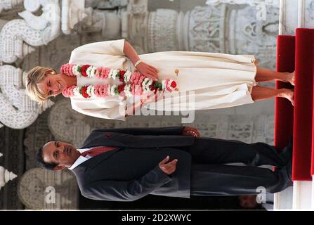 Diana, Princess of Wales wearing a traditional garland of flowers and a vermilion on her forehead is greeted by Mr V H Patel, a trustee at the Shri Swaminararyan Hindu Mission on her arrival at the hindu temple, in Neasden north London today (Friday).  Barefoot Diana will spend an hour touring the 'mandir' or temple, which is the largest outside India.  See PA story ROYAL Diana.  Photo by Michael Stephens/PA. Stock Photo