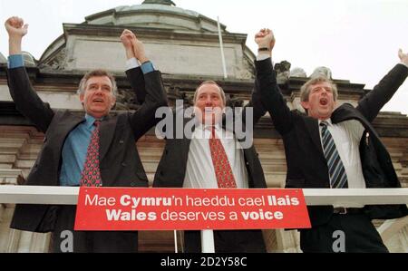 From left to right: Welsh Ministers, Peter Hain, Secretary of State for Wales, Ron Davies and Win (correct) Griffiths outside Cardiff City Hall this morning (Friday) celebrate the victory of the 'Yes' vote in the Welsh referendum on devolution. Photo Barry Batchelor/PA Stock Photo