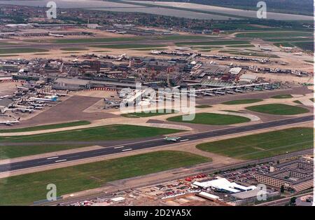 Aerial view of London Heathrow Airport, which ground to a virtual halt today (Friday) after a fire was discovered in the roof space of a restaurant in the Terminal One building. 19/03/02 : Heathrow Airport, London, where robbers have made off with three million dollars in cash Tuesday March 19, 2002, after hijacking a security van. The authorities were still reeling from the audacious heist at Heathrow last month in which raiders managed to slip in to - and out of - a secure zone supposedly even better protected in the wake of September 11. 23/07/02 Options for a major expansion of Britain's Stock Photo