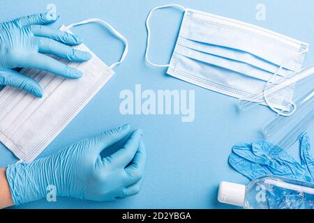 Medical gloves mask and alcohal gel for protecting infection during Coronavirus pandemic Stock Photo