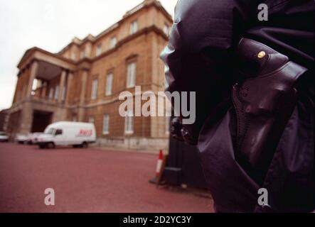 An armed policeman stands on duty outside Lancaster  House,  London, in preperation for tomorrow's Northern Ireland peace talks, today (Sunday).  See PA Story ULSTER Talks.  Photo by Peter Jordan/PA.      Stock Photo