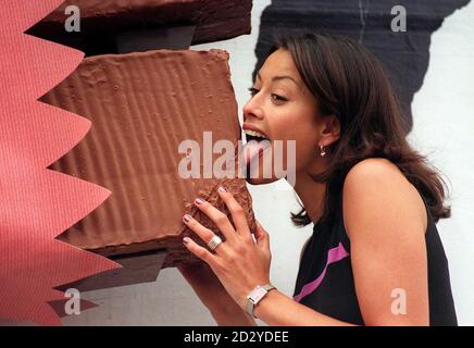 Big Breakfast star Melanie Sykes launches Cadbury's latest bar the Snack Wafer with a 12 foot long, 30 times magnification of the biscuit on a billboard in London today (Thursday).  Photo by Tony Harris/PA. Stock Photo