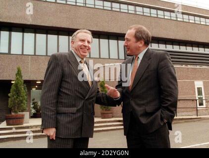 Minister of State for Northern Ireland, Paul Murphy (left)  greets Secretary of State for Wales, Ron Davies outside Castle Building, Stormont, the venue for the All Party Talks, today (Monday). Picture by Brian Little/PA Stock Photo