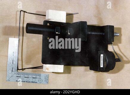 Library file, dated 7/12/97. Police issued picture of a device found in a Sainsbury's shopping bag which was accidentally taken home by a 73-year-old woman from a supermarket trip in west London. The device, about 20cm long and containing a timer, a spring, a copper tube and a shotgun cartridge, had the words Mardi Gra printed on it: Police hunting the notorious Mardi Gra bomber tonight (Wednesday) arrested an armed man at a Sainsbury's supermarket in West Ruislip, west of London, where a suspect package was found. See PA Story POLICE Gra. PA Photos Stock Photo