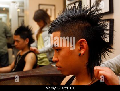 A man is seen with a 'Tecktonik' hairstyle in a hairdressing salon in Paris March 7, A man is seen with a 'Tecktonik' hairstyle in a hairdressing salon in Paris March 7,