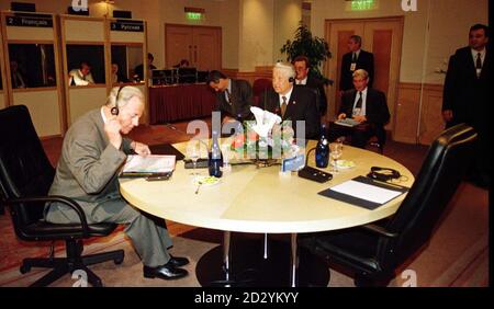 President of the European Commission, Jaques Santer (left) and President of the Russian Federation, Boris Yeltsin, start their three cornered meeting without the delayed Tony Blair at the G8 summit in Birmingham today (Friday). Photograph by David Jones/PA Stock Photo