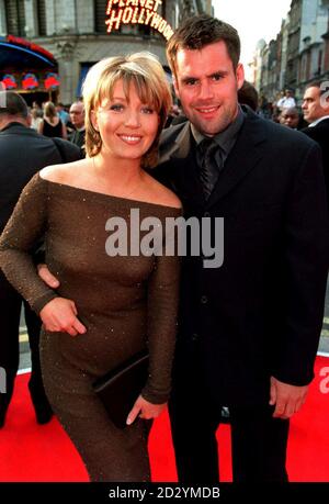 News Reader Kirsty Young arrives with Scottish Rugby Union player Kenny Logan for the BAFTA TV awards ceremony at the Prince of Wales Theartre in Leicester Square. Stock Photo
