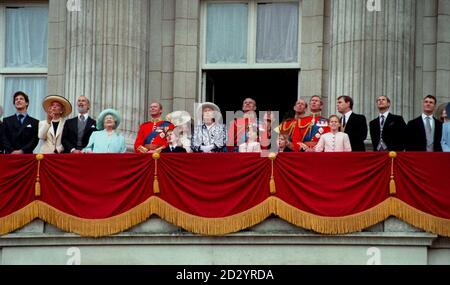 THE QUEEN AND PRINCE PHILIP WATCH THE TRADITIONAL FLY-PAST FROM THE BALCONY OF BUCKINGHAM PALACE FOLLOWING THE TROOPING OF THE COLOUR IN HONOUR OF THE QUEEN'S OFFICIAL BIRTHDAY. LEFT TO RIGHT. LORD FREDERICK WINDSOR, PRINCESS MICHAEL OF KENT, PRINCE MICHAEL OF KENT, THE QUEEN MOTHER, GRAND DUKE OF LUXEMBOURG, LORD DOWNPATRICK, GRANDSON OF THE DUKE OF KENT; THE QUEEN, THE DUKE OF EDINBURGH, LADY HELEN TAYLOR, THE DUKE OF KENT, PRINCE CHARLES, THE DUKE OF YORK AND PRINCE EDWARD. THE THREE LITTLE GIRLS L-R PRINCESS EUGENIE, LADY MARINA-CHARLOTTE WINDSOR - GRANDDAUGHTER OF THE DUKE OF KENT AND PRI Stock Photo