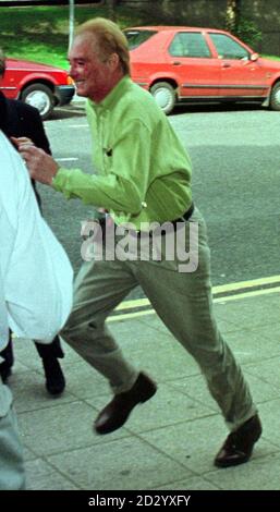 Coronation Street actor Bruce Jones, who plays Les Battersby, dodges  the media at Stockport Magistrates Court,  where he appeared  today (Monday), accused of drink driving. Pic Dave Kendall. See PA Story COURTS Street. Stock Photo